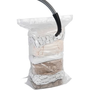 Wenko Vakuumbeutel Cube L (70x100x35 cm) mit Textilien und Staubsauger-Aufsatz.