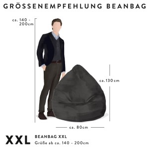 Größenempfehlung: Gelber Sitting Point Sitzsack Easy (300 l) neben einer Person zur Größenorientierung.