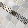 Verosan+ Duschrinne Isel, 70 cm, Edelstahl, eingebaut im Badezimmer.