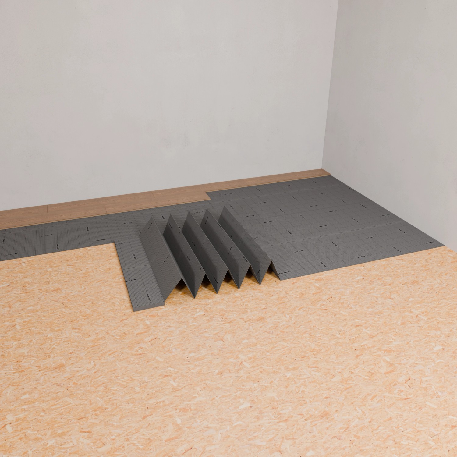 Graue Laminat Trittschallunterlage Floor Perfect 2 mm auf Holzboden, teilweise verlegt.