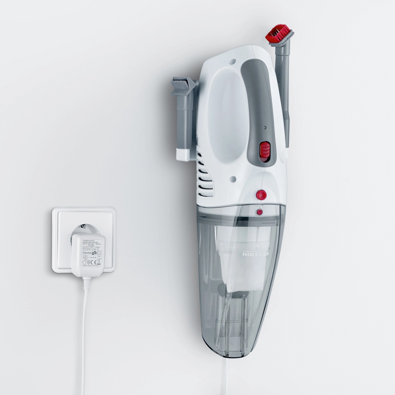 Severin Akku-Handstaubsauger HV 7144 Wet/Dry mit Zubehör an Wandhalterung.