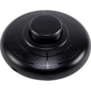 Schwarzer, runder Wippen-Fußtretschalter für Lampeninstallationen.