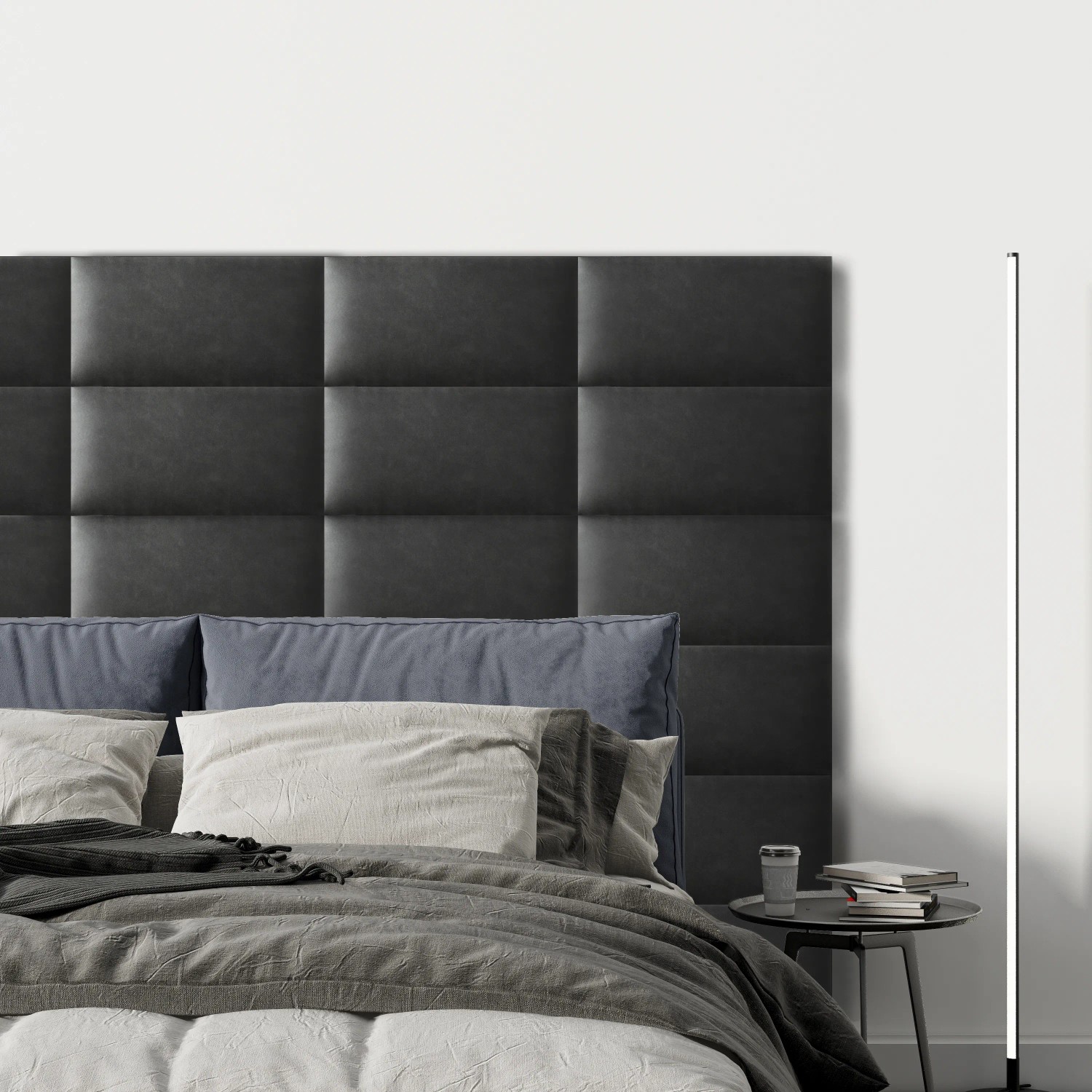 Wandkissen Rechteck, 60x30 cm, Dunkelgrau in Leder-Optik als Wandpaneel hinter einem Bett.