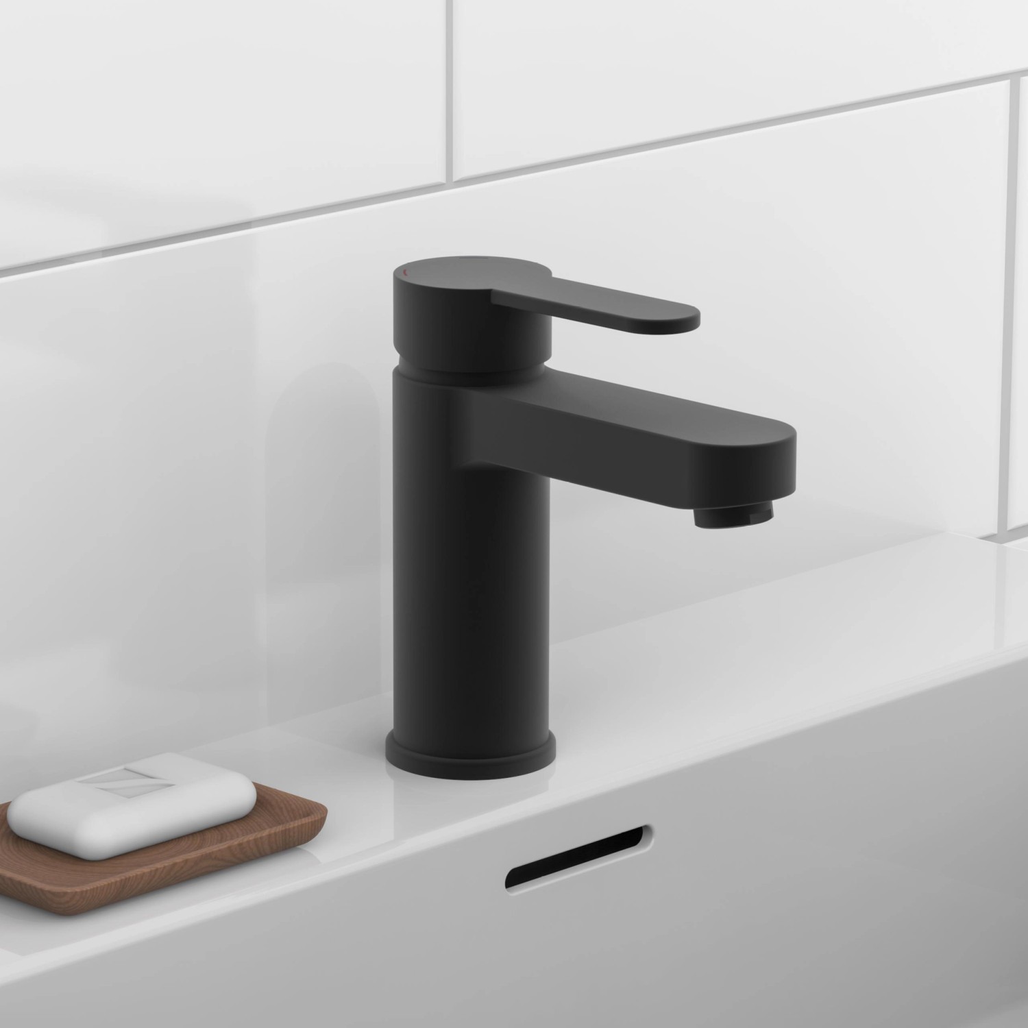 Schwarze Schütte Waschtischarmatur Elephant auf weißem Waschbecken mit Seife.