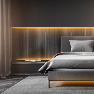 Schlafzimmer mit indirekter Beleuchtung durch Brilo LED-Strip COB Warmweiß unter dem Bett und am Kopfteil.