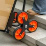 DURHAND Treppensteiger: Detailansicht der orange-schwarzen Dreifachräder beim Transport einer Box auf Steinstufen.