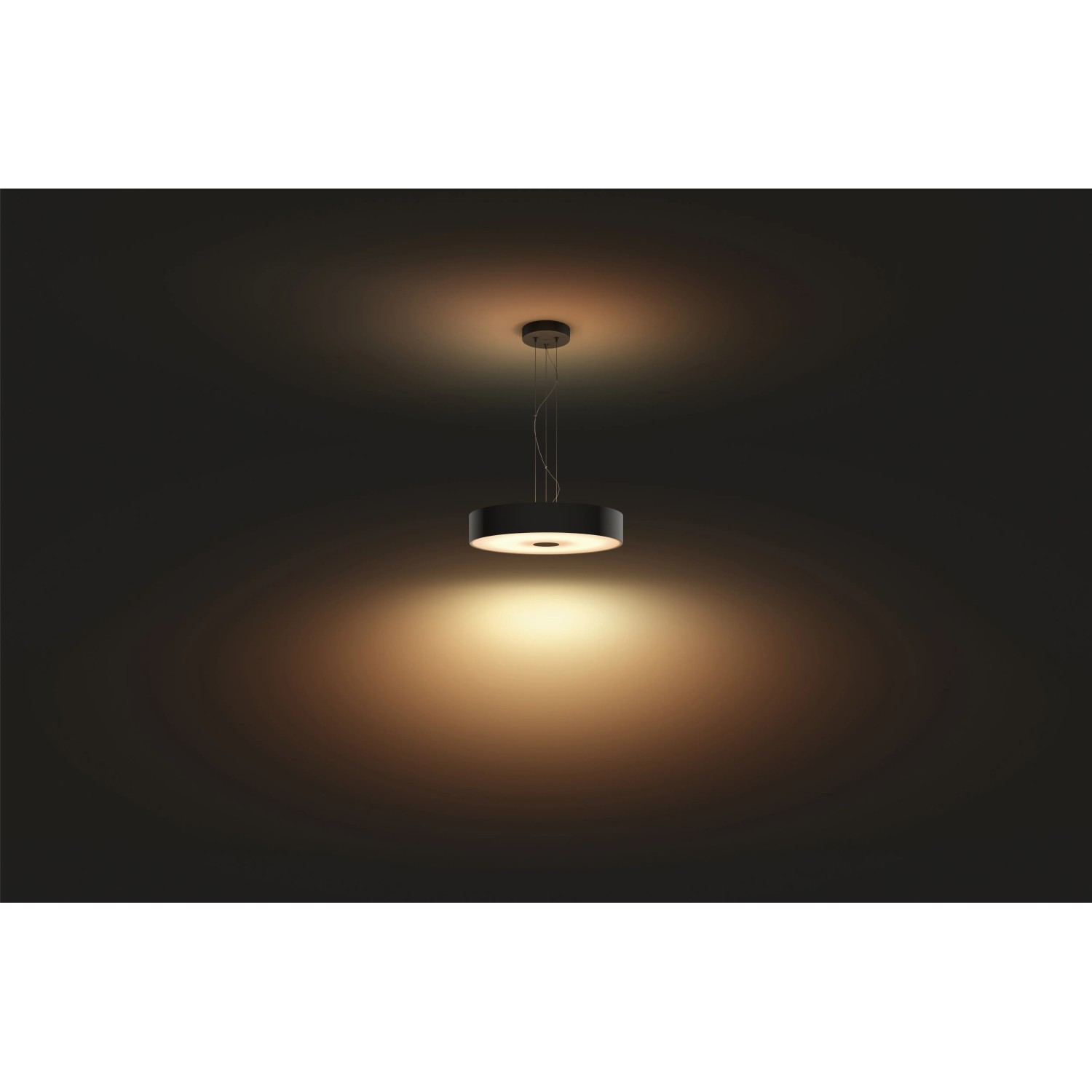 Schwarze Philips Hue Pendelleuchte Fair White Ambiance mit Dimmer und warmweißem Licht.