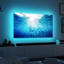 Paulmann MaxLED TV-Hintergrundbeleuchtung mit blauem LED-Streifen am 65 Zoll Fernseher.