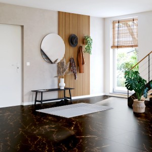 Verlegtes Feinsteinzeug, poliert, 60x120 cm, in dunkler Marmor-Optik im Eingangsbereich.