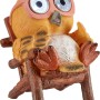 Brauner Solar LED Vogel mit Brille auf Holzstuhl, 8x11x15cm. Deko für Garten und Balkon.