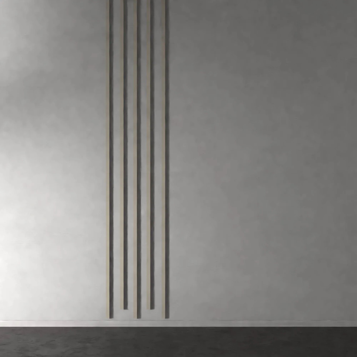 Denpanels Sticks Linoleum Pebble, 4 Paneele mit Klebeband in Schwarz an Wand.