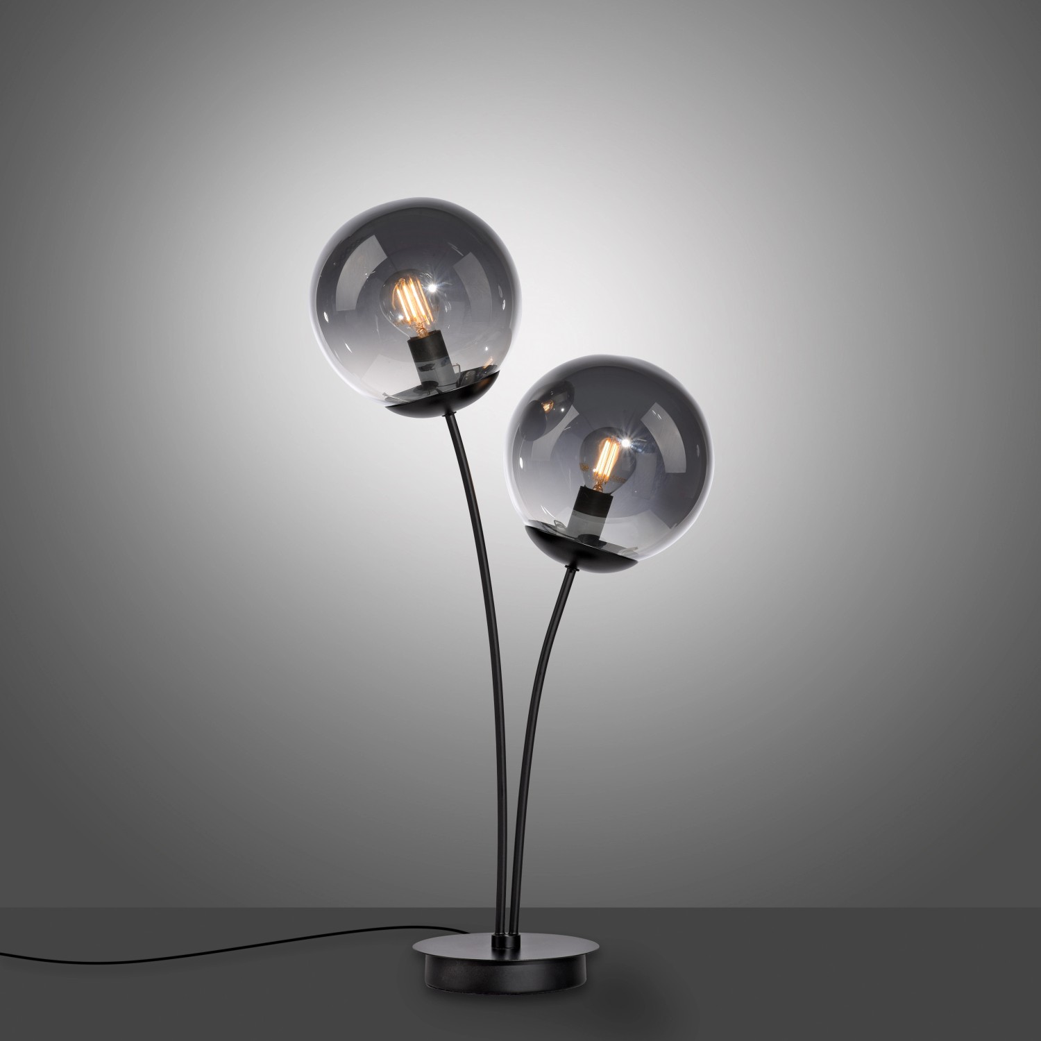 Schwarze Just Light Design-Tischleuchte Big Widow mit zwei rauchfarbenen Glaskugeln.