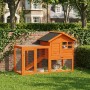 Orangefarbener PawHut Kaninchenstall aus Tannenholz mit zwei Ebenen, Gitterlaufstall und Kaninchen im Garten.