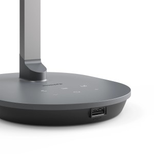 Dunkelgraue Philips LED-Tischleuchte Sword mit USB-Ladeanschluss und Bedienelementen.