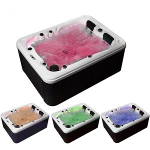 Home Deluxe Outdoor Whirlpool Beach Pure, dunkelgrau-weiß, mit farbiger Beleuchtung.