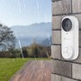 Kabellose Ezviz Video-Türsprechanlage DB2 PRO mit Gong, montiert an einer Steinwand im Regen.