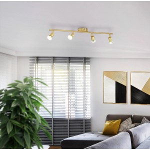 Messingfarbiger Eglo Spot Buzz-LED, 4-flammig, 68,5 cm breit, im Wohnraum.