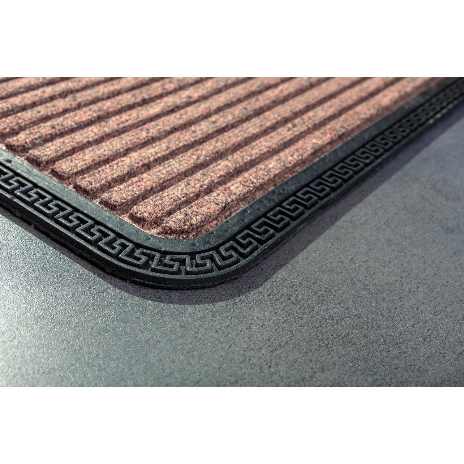 Braune Astra Fußmatte Border Star, 50x80 cm, mit Rillenstruktur und dekorativem Rand.