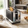 HOMCOM Toaster schwarz-silber mit Toastscheibe, 7 Bräunungsstufen, Auftau- & Aufwärmfunktion auf Küchentheke.