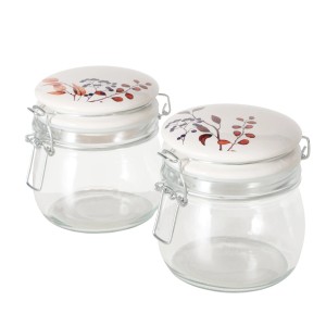 Zwei Boltze Home Vorratsgläser Brinja mit floralem Dekor auf weißem Porzellandeckel.