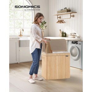 Beiger Songmics Wäschesammler Ronex mit 3 Fächern und 120 l Fassungsvermögen im Badezimmer.
