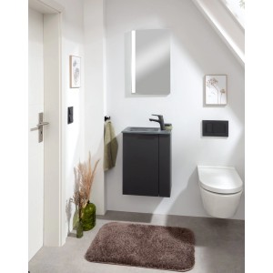 Fackelmann Mini-Waschtischunterschrank SBC, Schwarz Matt, im Badezimmer mit Spiegel und WC.