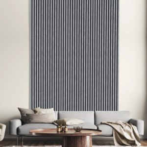 FN Acustico Akustikpaneel in Betonoptik mit schwarzem Filz, montiert an einer Wand über einem Sofa.