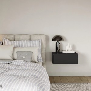 Schwarzer, wandhängender Nachttisch Framme mit Schublade im Schlafzimmer. Modernes Design, platzsparend.