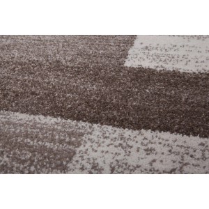 Detailansicht des beigen Lalee Teppich Feeling 501 (120x170 cm) mit Kurzflor und Patchwork-Muster.