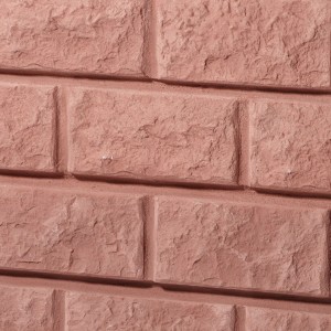 Detailansicht des Garantia Wandtanks Rocky 400 l in Redstone mit Backsteinoptik.