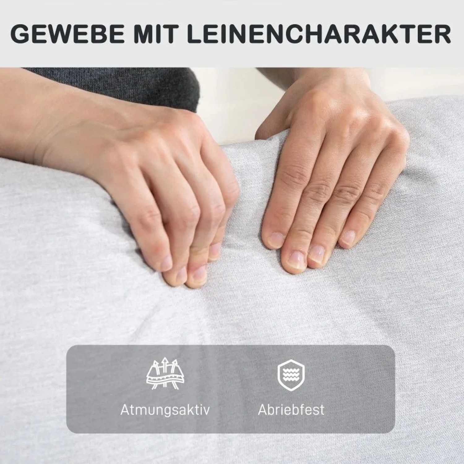 Hände drücken in hellgrauen Relaxsessel-Stoff mit Leinen-Look. Atmungsaktives, abriebfestes Polyestergewebe.