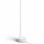 Weiße Philips Hue Gradient Signe Tischleuchte für stimmungsvolle Beleuchtung.