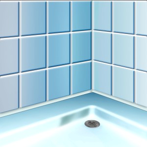 Badezimmer-Ecke mit blauen Fliesen und Abfluss. MEM Schimmel-Vernichter zur Reinigung nutzen.