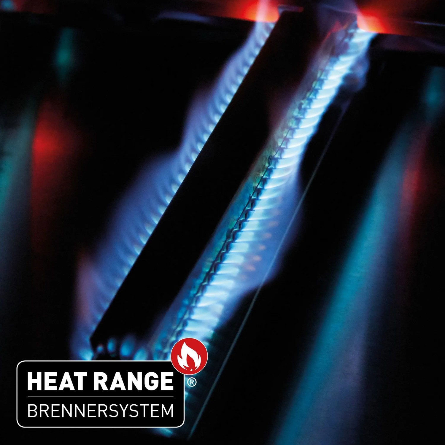Detailaufnahme: Enders Gasgrill Monroe Pro 3, Heat Range Brennersystem mit blauer Flamme.