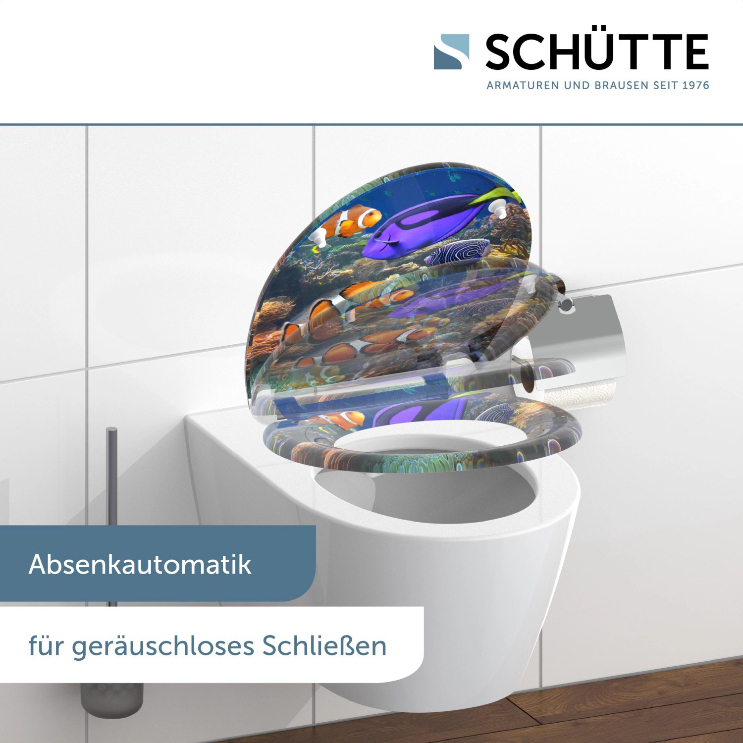 Schütte WC-Sitz Sea Life mit Absenkautomatik und Fisch-Motiv auf einem weißen WC.