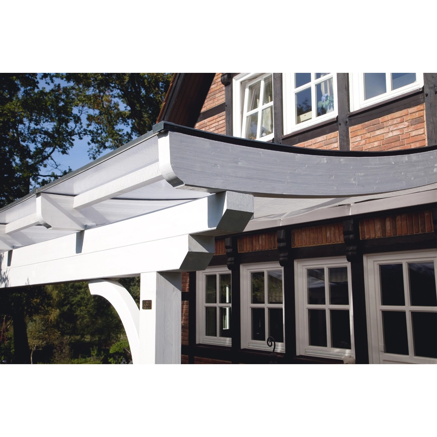 Skan Holz Terrassenüberdachung Verona, 541x239 cm, Leimholz Natur, mit geschwungenen Sparren und Doppelstegplatten.