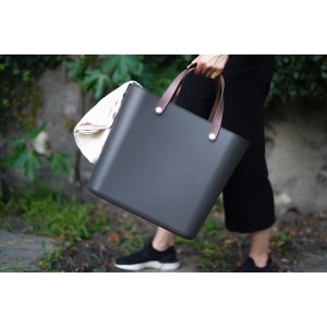 Anthrazitfarbene Rotho Multibag Style Albula 25L Einkaufstasche mit braunen Henkeln.