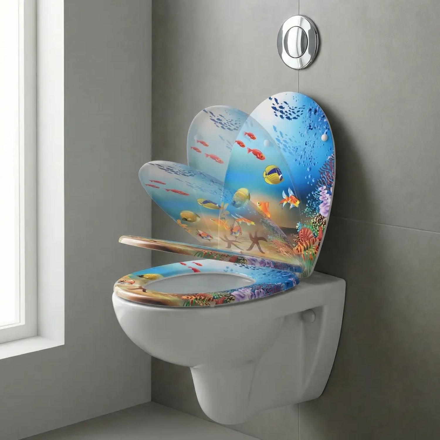 Ovaler Sinobath WC-Sitz mit Unterwasserwelt-Design, Fischen, schließt sanft dank Absenkautomatik.