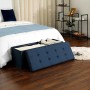 Blaue Songmics Sitztruhe (110 cm) mit Stauraum im Schlafzimmer, Deckel geöffnet.