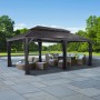 Sojag Pavillon Messina 12x20 Anthrazit mit Möbeln und Moskitonetz im Garten.