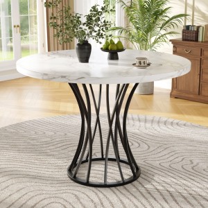 Eleganter runder Esstisch mit weißer Marmoroptik-Platte und schwarzem, skulpturalem Metallgestell für Esszimmer.
