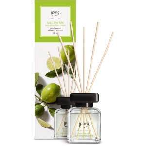 ipuro ESSENTIALS Raumduft Lime Light 100ml mit Duftstäbchen und Verpackung mit Limetten-Motiv.
