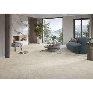 Heller Raum mit Parador Trendtime 3 Laminat in Lärche Yukon Weiß im Fischgrätmuster.