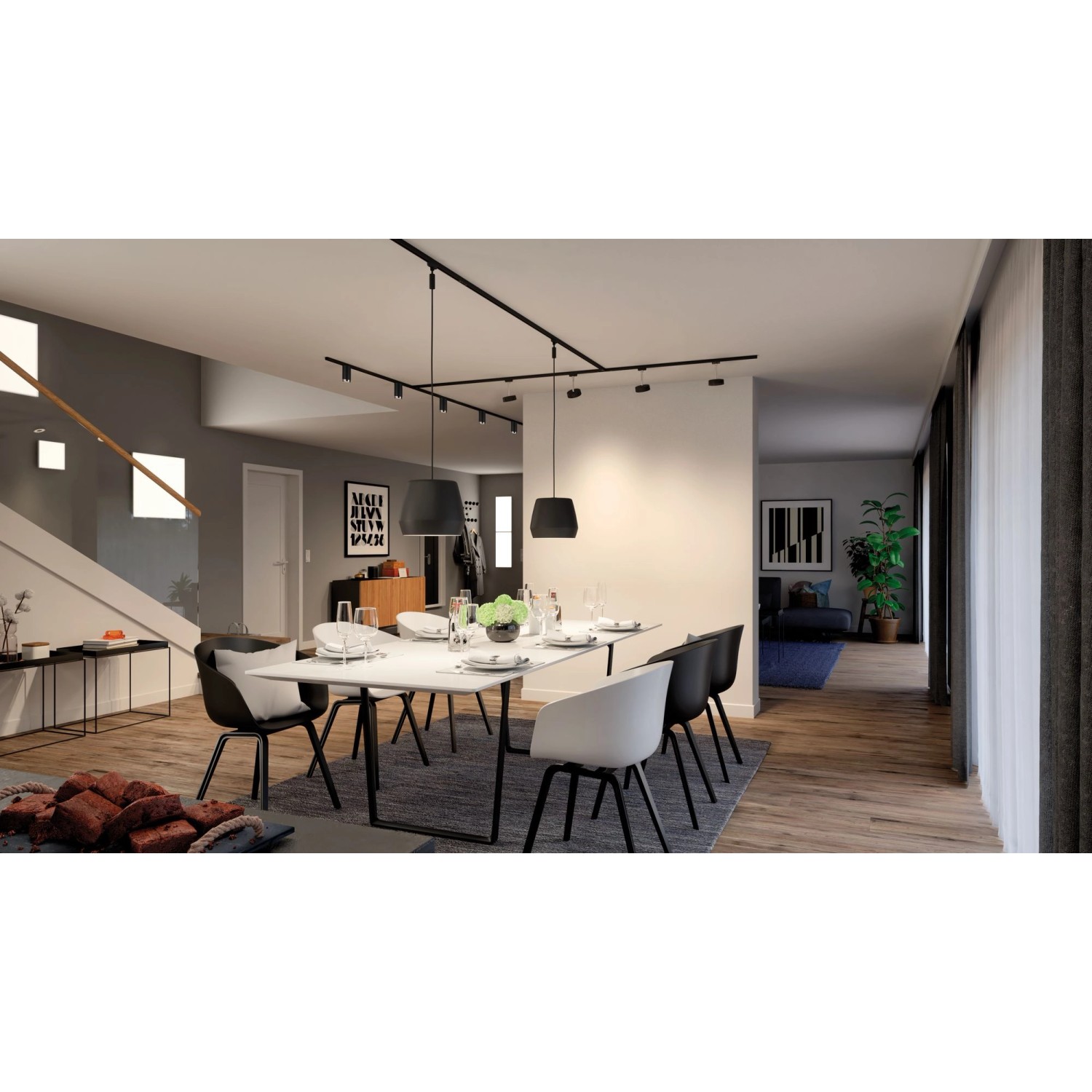 Schienensystem mit schwarzen, dimmbaren Paulmann LED Reflektorlampen GU10 über Esstisch.