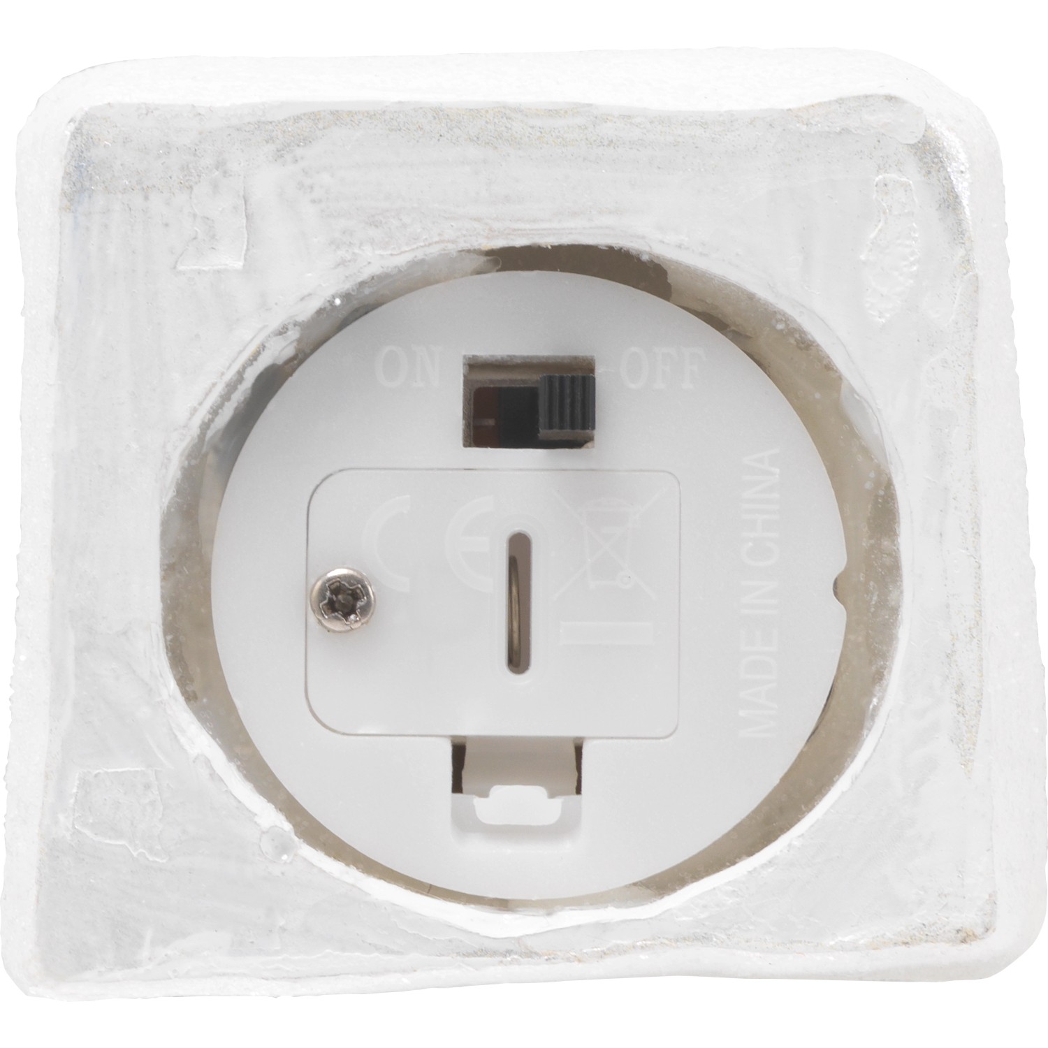 Rückseite der beleuchteten Tischdeko Weihnachtshaus mit Batteriefach und Schalter.