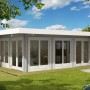 Unbehandeltes Alpholz Gartenhaus Viva B mit Flachdach und Anbaudach im Garten.