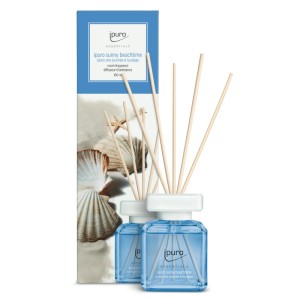 ipuro Essentials Raumduft Sunny Beachtime, 100ml mit Rattanstäbchen und Verpackung.