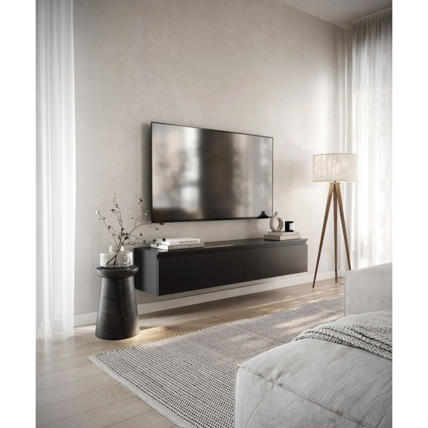 Schwarzes Selsey TV-Hängeboard Bemmi 150 cm, wandmontiert unter einem Fernseher im modernen Wohnzimmer. Mit Stauraum.