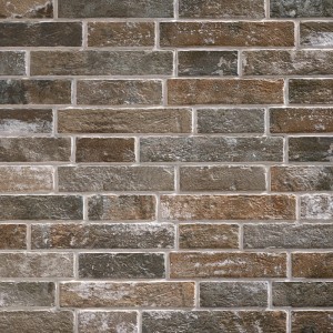 Anthrazitfarbener Verblender UltraStrong Klimexmilano aus Feinsteinzeug für Innen & Außen.