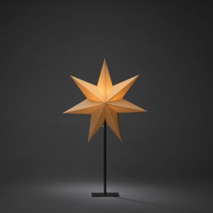 Beige Papier-Sternleuchte auf schwarzem Ständer. Beleuchtete Weihnachtsfigur für Innenräume mit LED-Technik.